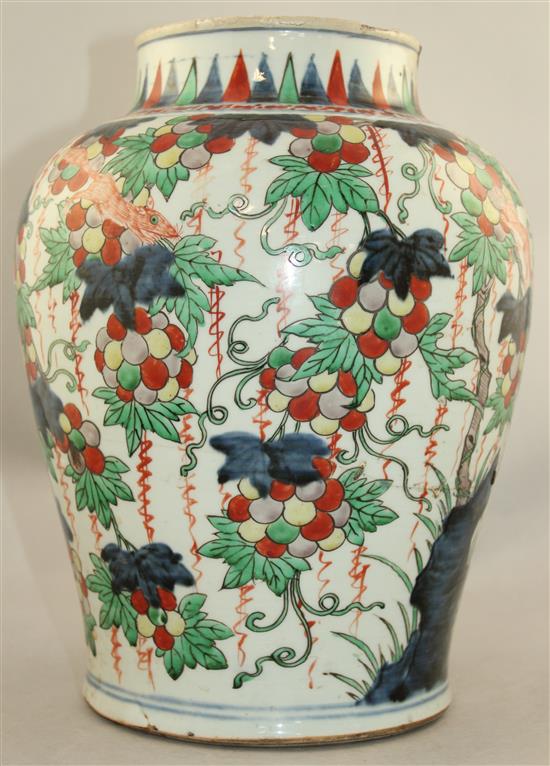 A Chinese wucai baluster jar, 17th century, 32cm., broken and restored